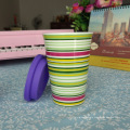 Customized bone china travel mug silicone lid and sleeve in different colour